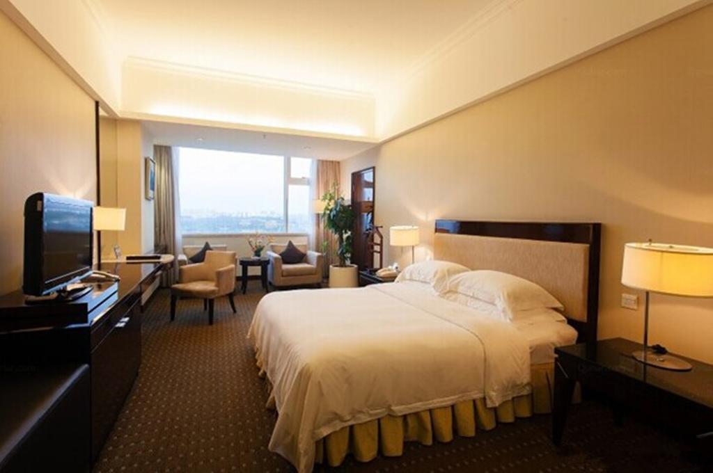 Tienyow Grand Hotel Хайкоу Номер фото