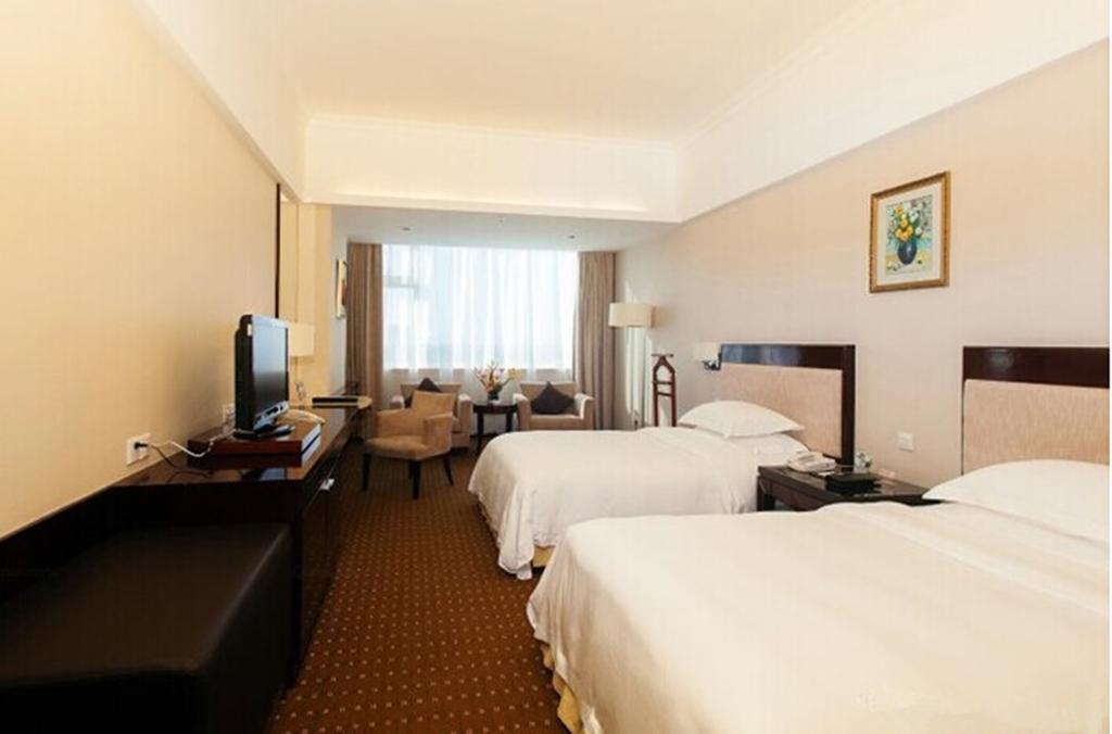 Tienyow Grand Hotel Хайкоу Номер фото