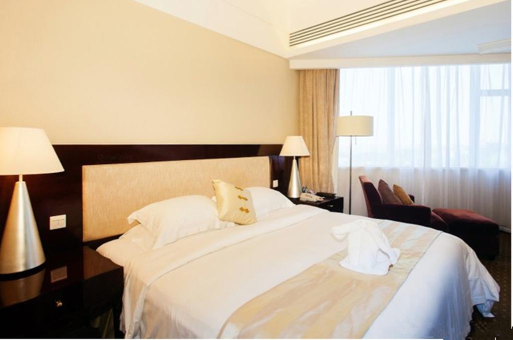 Tienyow Grand Hotel Хайкоу Номер фото